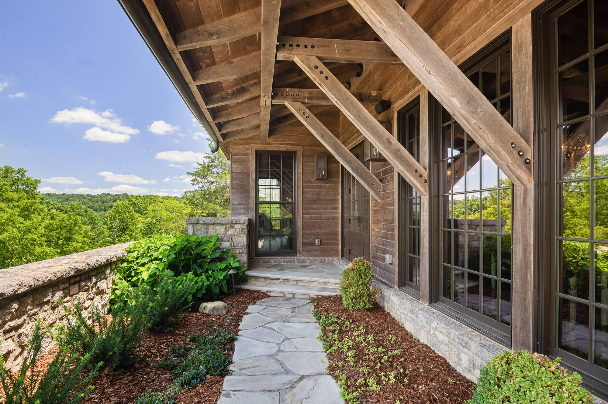 Scenic Timber-Beamed Patio – Middle Tennessee Hewn Custom Home A luxury custom home in williamson county built by hewn